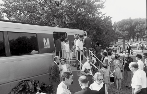 Crowds walk through a mock-up of a Metro Railcar (1968).