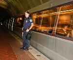 MTPD officer patrols Metro station.
