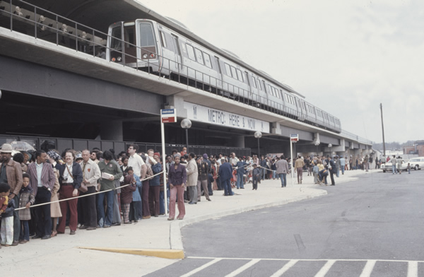 People stand in line waiting to take a free ride at the opening of the new Washington Metro (March 27, 1976).