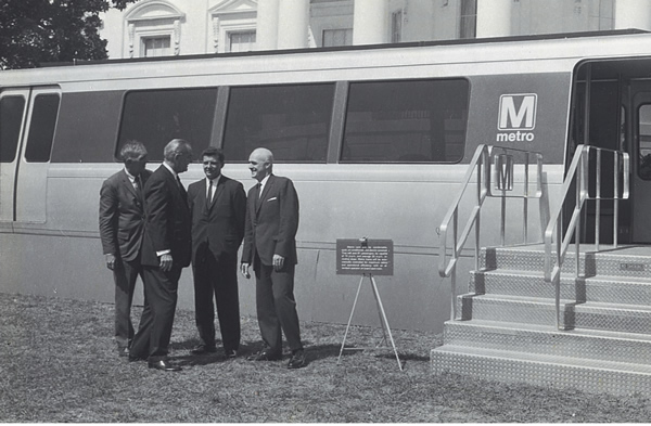 President Johnson inspects a model of a Metro car on the White House lawn in 1968 - eight years before Metrorail opened to the public.