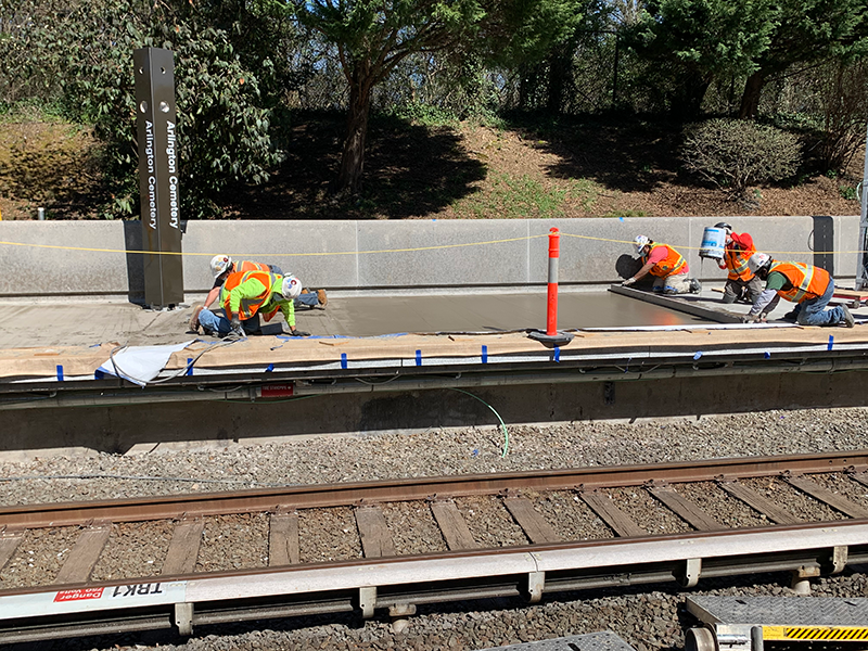 Leveling the topping slab at Arlington Cemetery Station